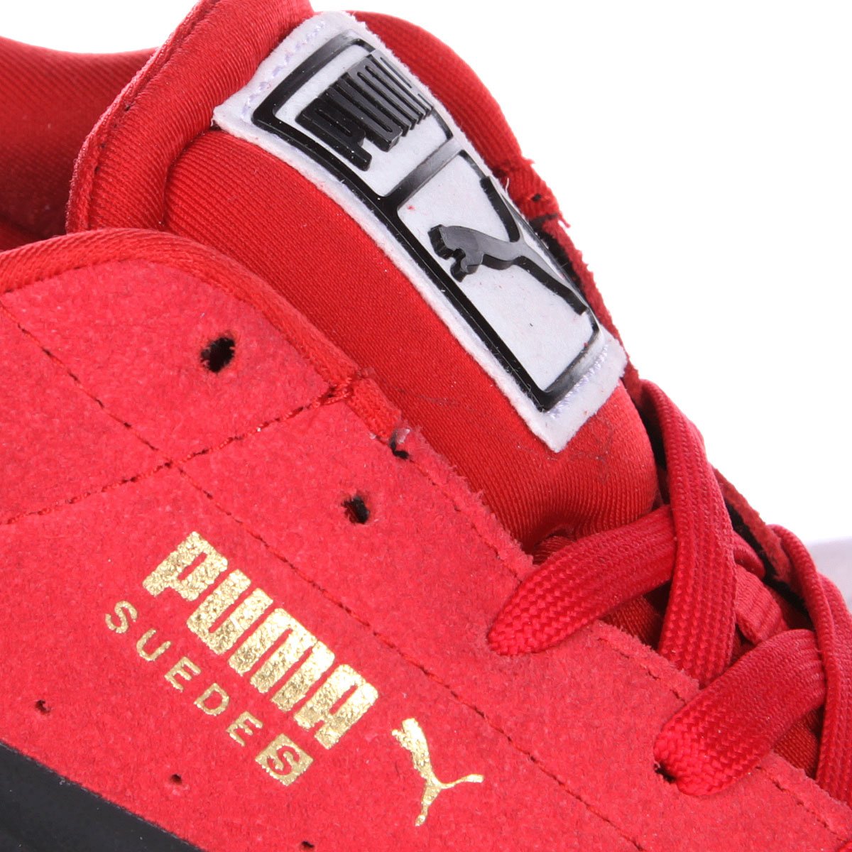 red black puma suede