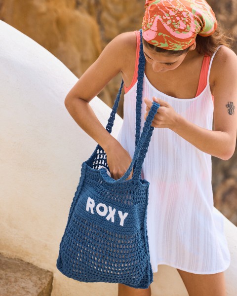 .//  /- SLOGAN TOTE