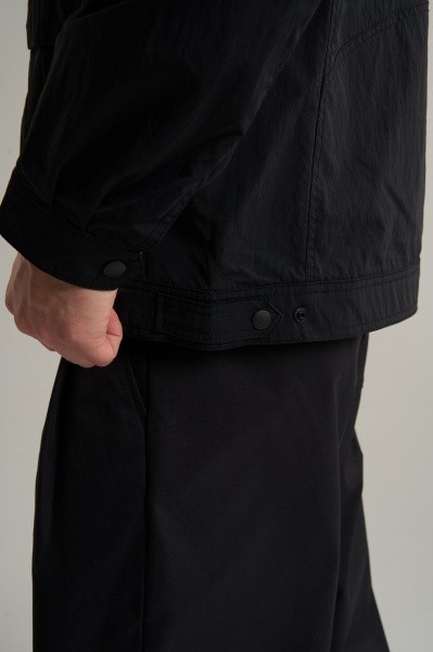 �������� ANTA COMMUTE Woven Track Top