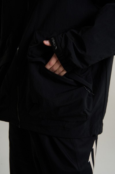 �������� ANTA KAI Woven Track Top