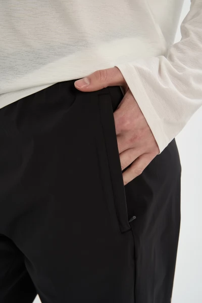 ����� ����������� Anta RUNNING Woven Track Pants