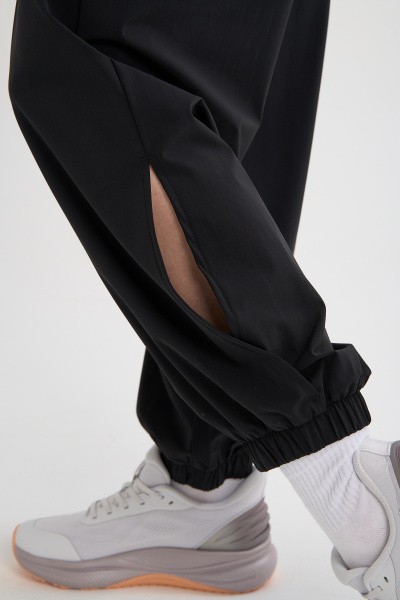����� ����������� Anta TRN-ESSENTIAL Knit Track Pants
