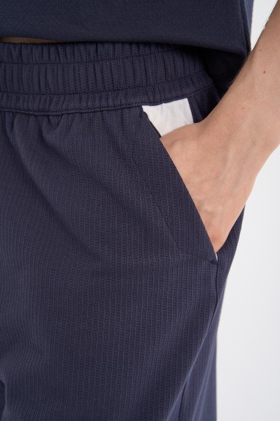 ����� ����������� Anta ICONIC Knit Half Pants