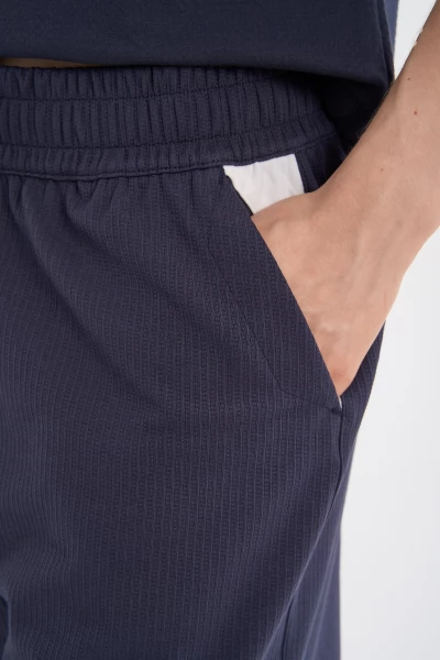 ����� ����������� Anta ICONIC Knit Half Pants