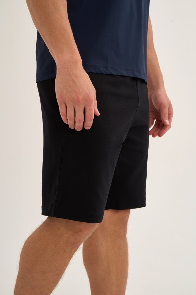 ����� ����������� Anta TRN-ESSENTIAL Knit Half Pants