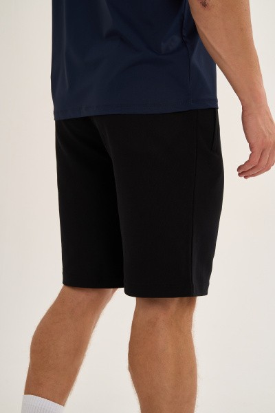 ����� ����������� Anta TRN-ESSENTIAL Knit Half Pants