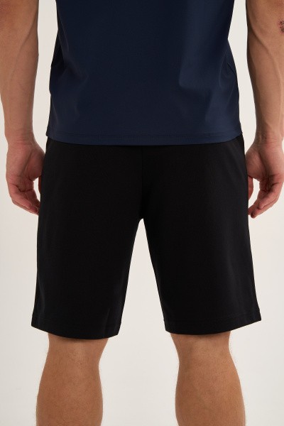 ����� ����������� Anta TRN-ESSENTIAL Knit Half Pants