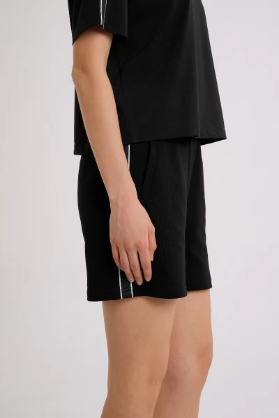����� ����������� Anta TRN-ESSENTIAL Knit Shorts