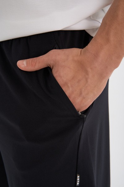 ����� ����������� Anta TRN Knit Half Pants