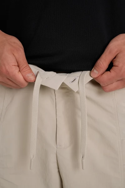 ����� ����������� Anta COMMUTE Woven Half Pants