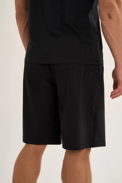 ����� ����������� ANTA TRN-ESSENTIAL Knit Half Pants